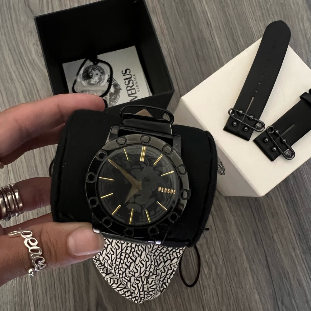 Brand new Versace watch with extra watch band with signature Versace safety pins